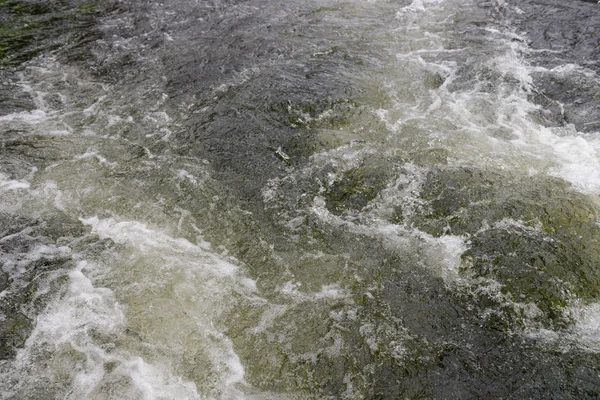 Wasseroberfläche Nahaufnahme, Hintergrund — Stockfoto