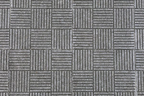 Image of gray street tiles close-up background