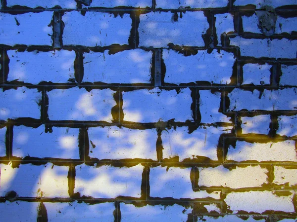 Textur. Wand aus Schaumstoffblöcken im Schatten. Foto — Stockfoto