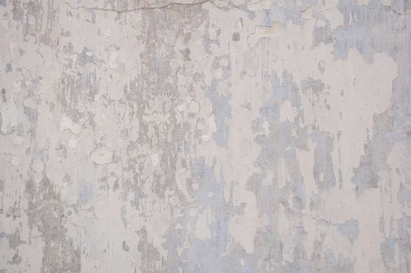 Alte graue Wand Hintergrund. Abblätternde Farbe. Foto — Stockfoto