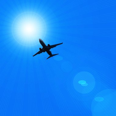 karanlık gökte uçan uçak silueti 