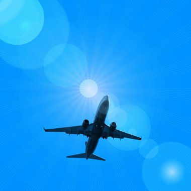 karanlık gökte uçan uçak silueti 