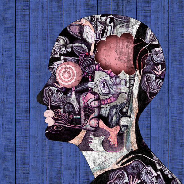 human head with drawings and blue wood background.
