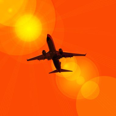 karanlık gökte uçan uçak silueti 