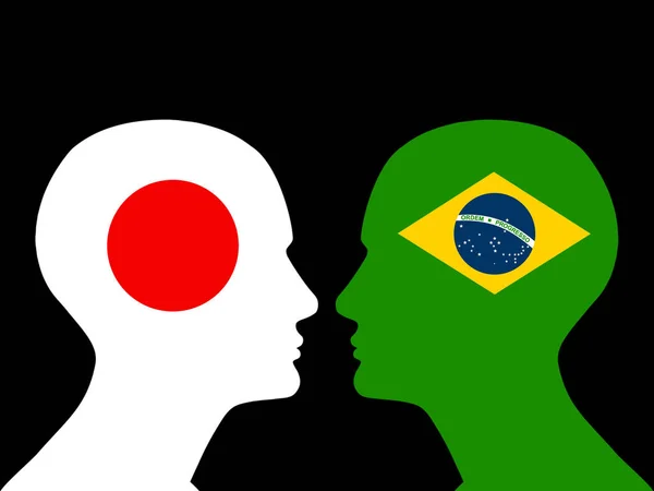 Человеческие Головы Флагом Бразилии Японии — стоковое фото
