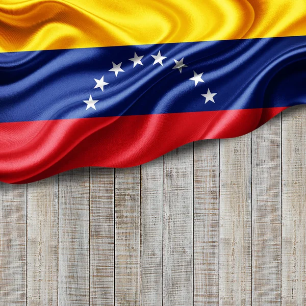 Venezuela flag of silk with copyspace for your text or images and wood background-3D illustration