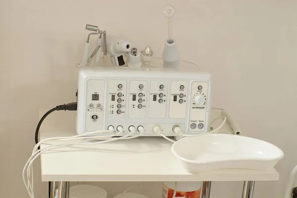 Cosmetic Multifunctional Device close-up in beauty salon.