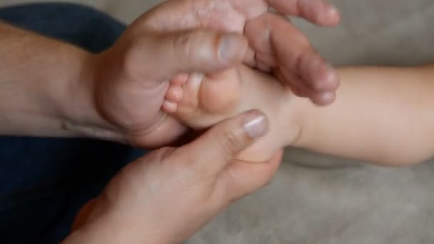 Male Massage Therapist Does One Year Old Baby Boy Child — Stock Video