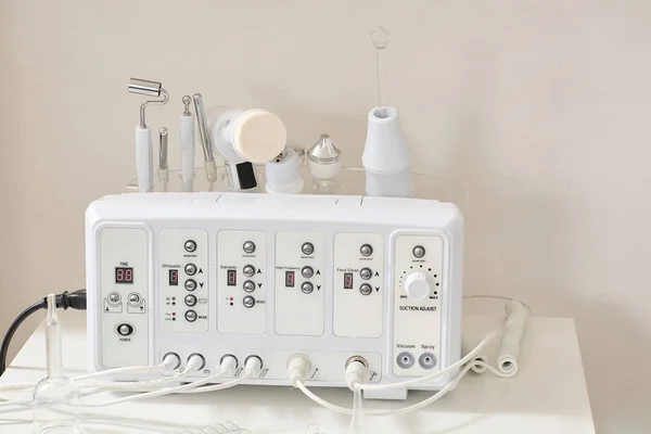 Cosmetic Multifunctional Device close-up in beauty salon.