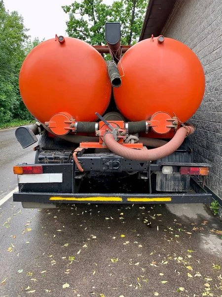 Sewage disposal truck, back view. Asinization Services