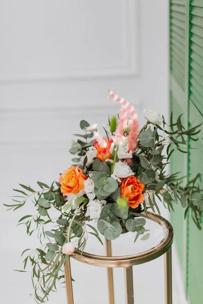 Delicate floral bouquet of spring flowers on white background