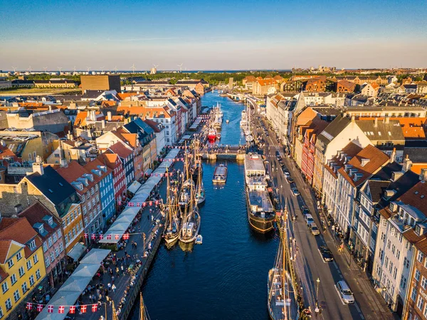 Copenhagen, Denmark Nyhavn New Harbour canal and entertainment district. The canal harbours many historical wooden ships. Aerial view from the top — Stock Photo, Image