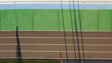 koç paten ilerler. Profwssional eğitim. Havadan video görüntüleri üst tenli. Spor teması yaratıcı orijinal sahne