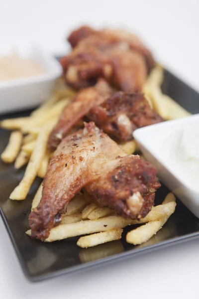 Chicken Wings, DIP, Fast Food, Fried chicken, chicken, meat, chicken wing, fastfood, finger, food, Food and Drink, french fries, Freshness, gastronomy, hand, meat, plate, sauce, dip sauce,