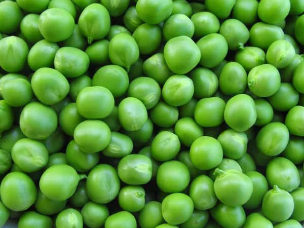 Green peas background or texture — Stock Photo, Image