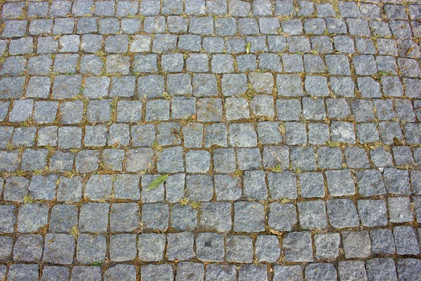 Hintergrund der Steinboden Textur. Pflaster auf Gehwegen im Park. — Stockfoto