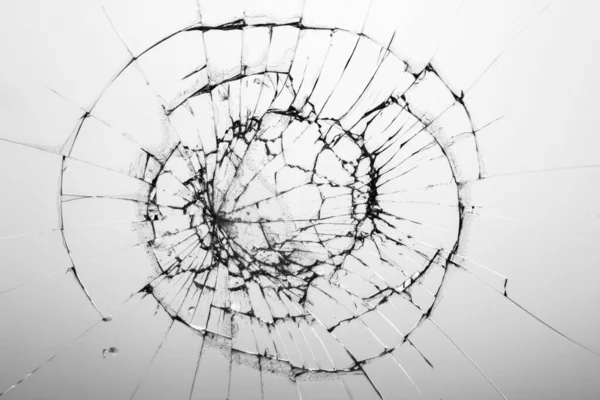 Törött üveg fehér háttér textúra. Törött üveg. Ütközés vagy lövés okozta repedések. — Stock Fotó