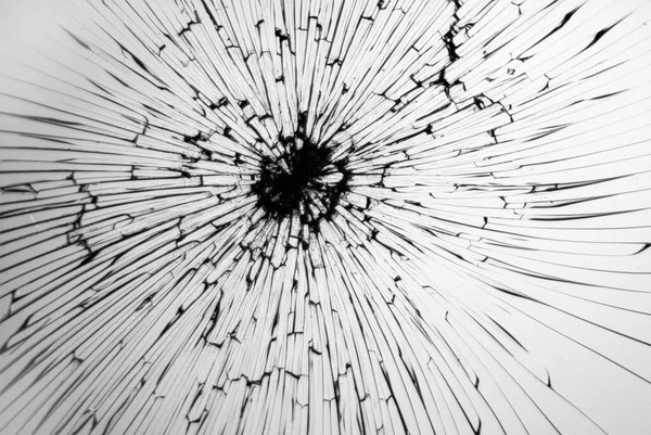 Cracked broken glass, cracked glass on white background, concept for design.