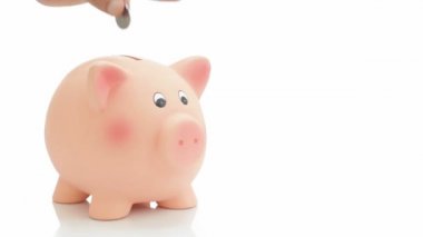 Para tasarrufu. Paraları bir kumbara koyarak el. Sorunsuz loopable