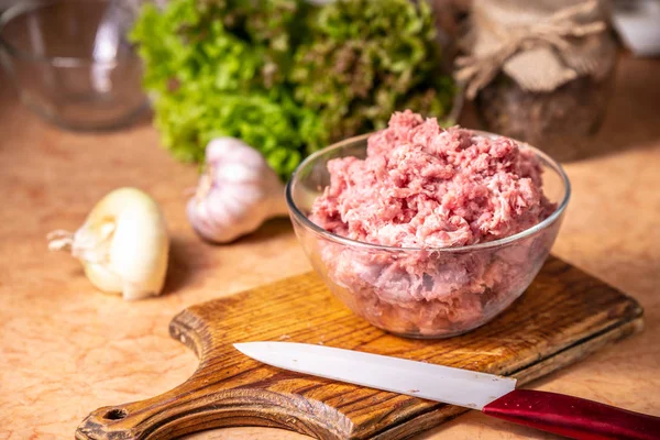 Minced pork in a glass bowl — Stock Photo, Image