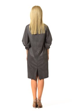 resmi poz Yöneticisi kadın yönetici tam vücut uzunluğu üzerinde beyaz izole kahverengi resmi elbise yüksek topuklu stiletto ayakkabı elbise