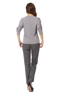 Genç beyaz iş kadın yürütme üzerinde beyaz izole yaz casual yazdırma bluz ve kot yüksek topuklu stiletto Ayakkabı tam vücut uzunluğu poz