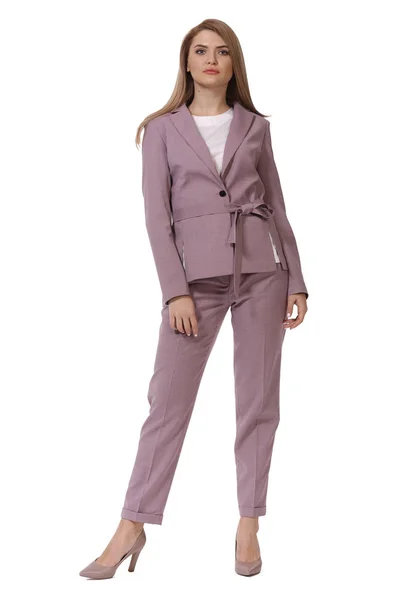 Blond business woman in pink official pant suit and stiletto hig Royalty Free Stock Photos
