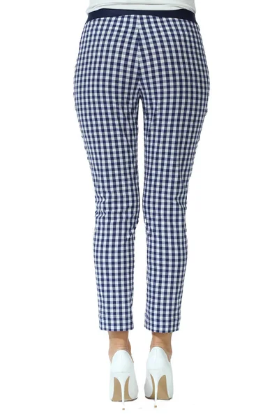formal checked trousers with belt on model legs with white stiletto heels