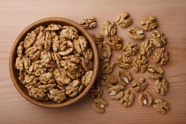 Walnut in wooden bowl — Stock Photo, Image