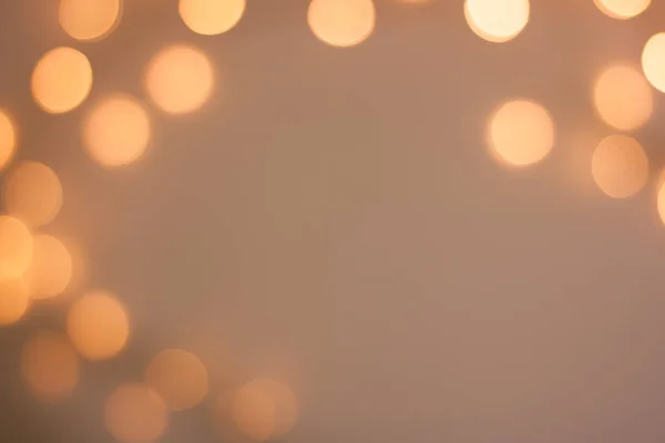 Blurred golden sparkling festive bokeh background — Stock Photo, Image