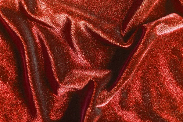 Фон текстури червоних оксамитових складок — стокове фото