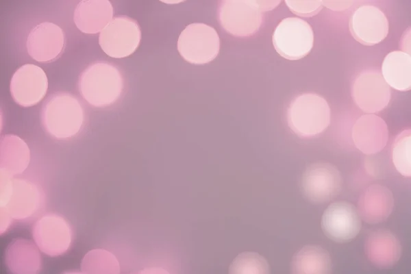Blurred purple sparkling festive bokeh background — Stock Photo, Image