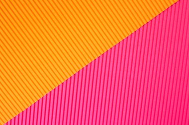 Canlı turuncu ve pembe moda renklerde soyut geometrik kağıt arka plan.