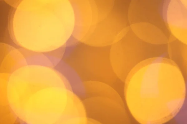 Golden glitter christmas abstract bokeh background. Blurred lights backdrop — Stock Photo, Image