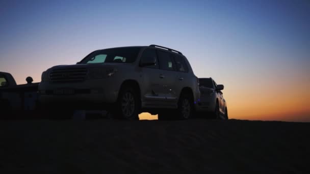 Safari car at the sunset in desert of Dubai. — Stock Video