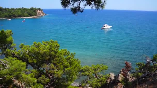 View from hill to Mediterranean Sea in Phaselis with yacht. City of ancient Lycia. Turkey. — Stock Video