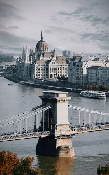 Budapest city top view of the Danube river, chain bridge and parliament. Vintage