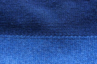 mavi doku karanlık yünlü kumaş parçasının