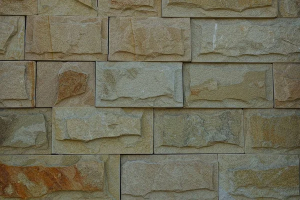 建物の壁にレンガの茶色の石のテクスチャ — ストック写真