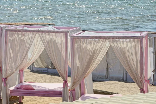 Two White Pink Open Gazebo Curtains Pillow Bedding Sand Beach — Stock Photo, Image