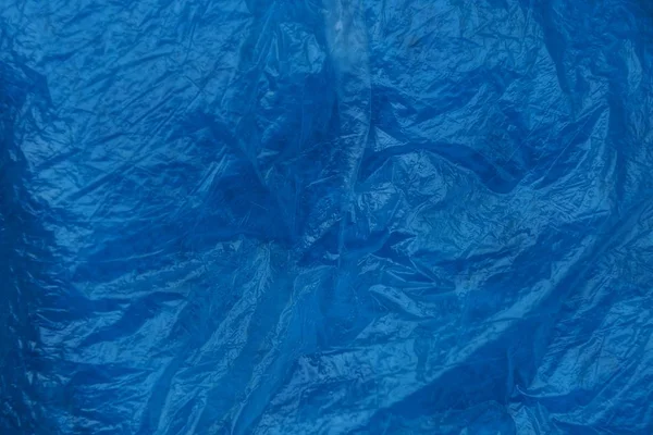 Blauwe Plastic Textuur Van Verfrommeld Stukje Cellofaan — Stockfoto