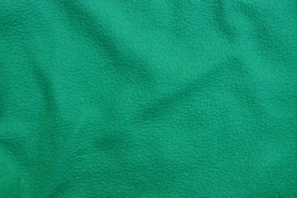 Grön Bakgrund Skrynkliga Tyg Kläder — Stockfoto