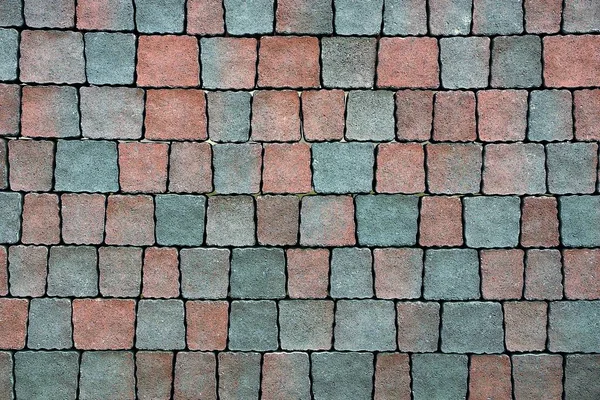 Texture of a fragment of colored square paving