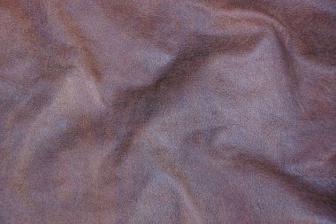 kahverengi doku buruşuk deri giysiler