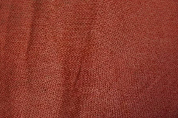 Kırmızı Kumaş Doku Giysilerindeki Buruşuk Maddenin Bir Parçasındaki — Stok fotoğraf