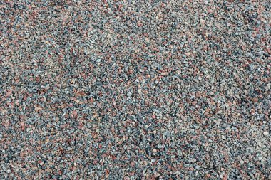 Bir yığın küçük taş gri kahverengi zemin