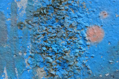 mavi doku kirli bir beton duvar parçası