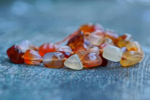 Old Brown Stone Beads Gray Table — Stock Photo, Image