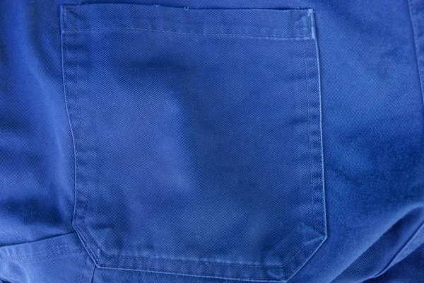 Mavi Kumaş Dokusu Ile Bir Cep Pantolon — Stok fotoğraf