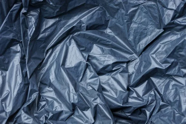 Textura Plástico Celofán Negro Una Bolsa Arrugada —  Fotos de Stock